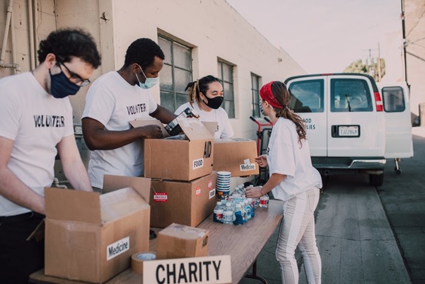 Volunteers handing out aid at a nonprofit event