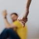A Person Forming a Fist