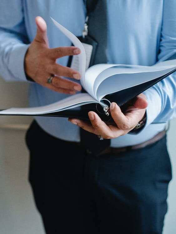 a person looking at documents